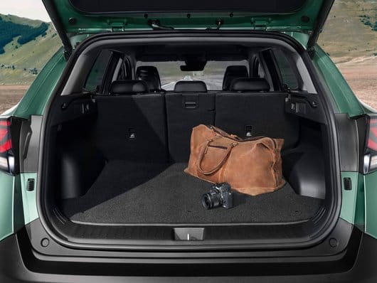 Vändbar bagagerumsmatta i velour, passar fordon med premium ljudsystem